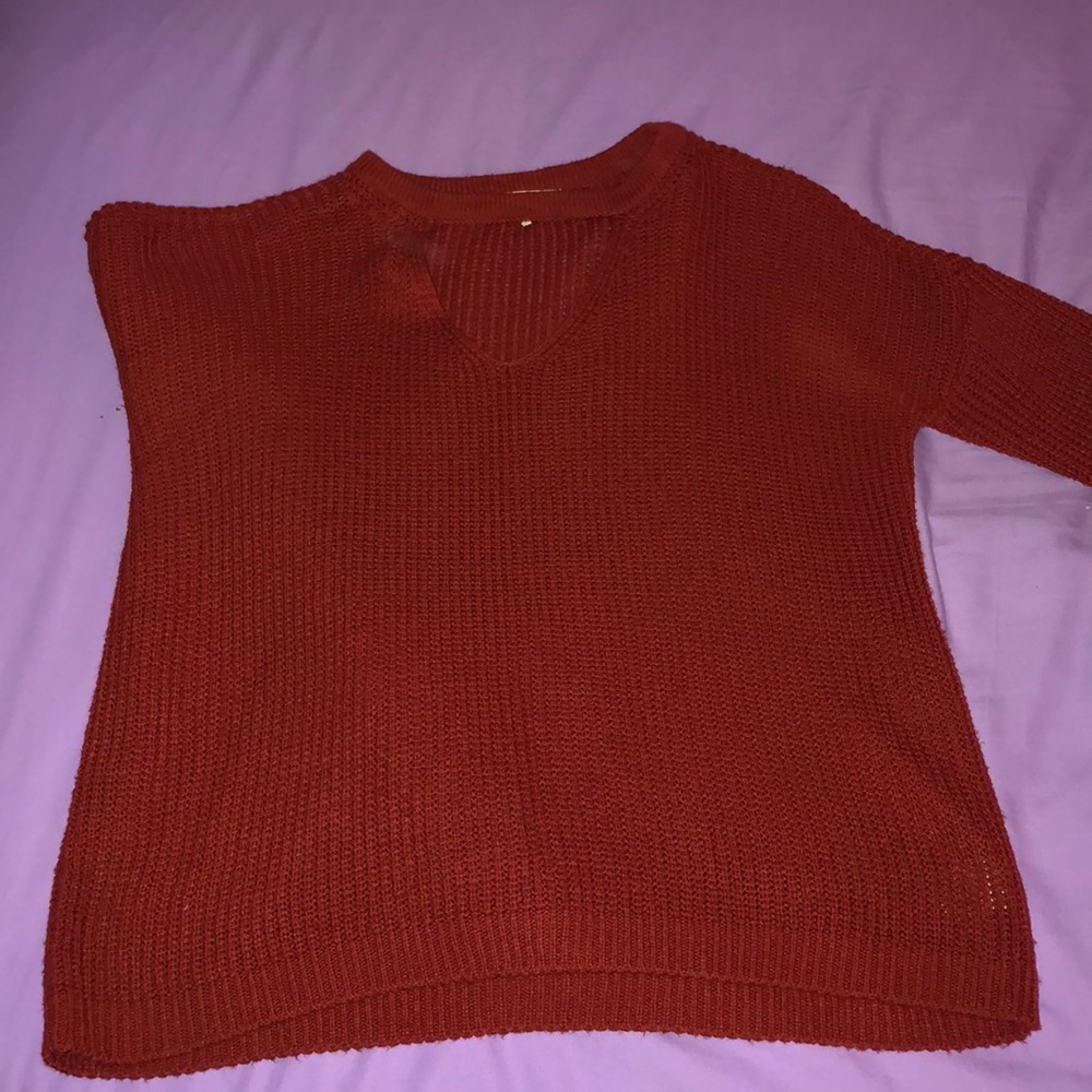 Red sweater with cutout